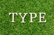 © bankrx - Wood letter in word type on green grass background