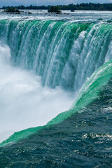 Wall Mural - Clouds of splashes and falling water from Niagara Falls, Niagara State Park