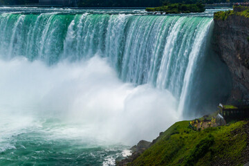 Wall Mural - Clouds of splashes and falling water from Niagara Falls, Niagara State Park