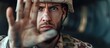 Portrait sad military soldier showing hand gesture to stop the war quickly. AI generated image