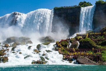 Wall Mural - Clouds of splashes and falling water from Niagara Falls, Niagara State Park