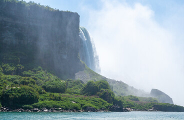 Wall Mural - Clouds of splashes and falling water from Niagara Falls, Niagara State Park