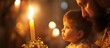 Innocent little girl holding a glowing candle and gazing at a thoughtful man in darkness