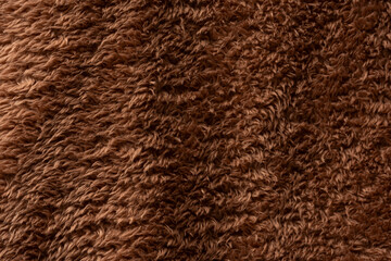 Wall Mural - Texture of a brown faux fur as a background.