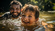 Father and child having fun and smiling at the outdoor pool at summer