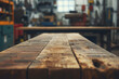 Wooden table in a carpentry workshop. Blurred background.