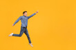 © Prostock-studio - Look At This. Teen boy pointing aside while jumping up in air