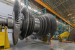 Assembly of a steam turbine rotor in a plant workshop.