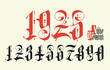 © paseven - Arabic numerals from 0 to 9 from a Gothic style font. Latin phrase From the Nativity of Christ.
