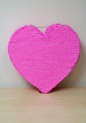 Wall Mural - pink heart on wooden background