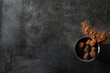 © Bidwell Studio - Chocolates with cocoa powder on dark tile surface