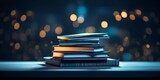 Stack of hardcover colorful and diffrent books on Blue Surface with Bokeh Lights Background. World book day, International literacy day, concept of education and learning. Generative ai