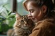 © Spicy World - Tender connection between a woman and the cat she holds lovingly in her arms