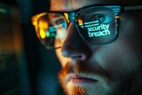 Fototapeta  - Cybersecurity Concept, Security Breach Reflection in Glasses on Man by Computer Monitor