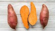 © Pauline - sweet potato isolated on white background closeup top view flat lay