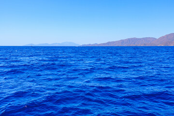 Wall Mural - View of the sea from an excursion yacht. Background with selective focus and copy space