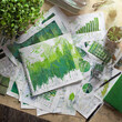 green washing, graphs and stats on documents with green paint splattered all around, companies pretending to be environmentally sustainable