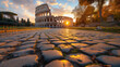 Colosseum during a quiet moment at sunset in Rome Italy, low angle view of the Colosseum at summer, dusk evening