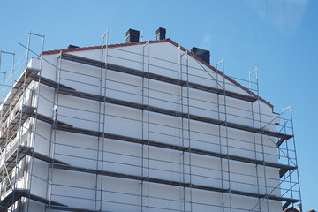  house under construction . Windows without glass