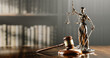 © Sikov - Legal Concept: Themis is the goddess of justice and the judge's gavel hammer as a symbol of law and order on the background of books
