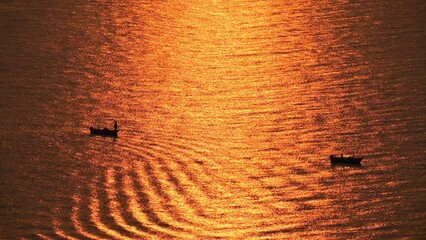 Poster - water surface of sea view with golden sunset in the evening, natural background