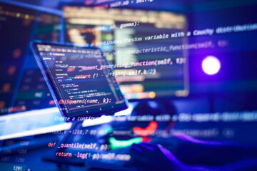 Working atmosphere of a programmer at home, background. Programming code abstract screen