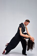 © Roman - World Dance Sport Federation Dancers On Rehearsal In Studio, Sport Dance. in classic formal wear suit and dance dance with passion. sensual dancers dancing walz, tango, slowfox and quickstep.