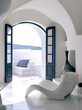 A minimalist style room in Santorini with sea views.
