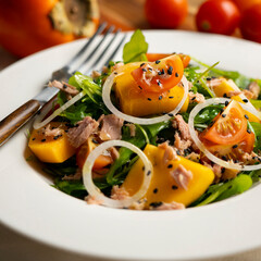 Wall Mural - Persimmon, tomato, onion and tuna salad.