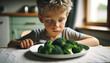 Child refusing to eat vegetables, boy disliking Broccoli.If your child doesn't like a particular vegetable, try offering small amounts of the vegetable with another healthy food that your child likes