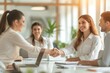 © steevy84 - Diverse business team in a bright corporate office shake hands and make a deal