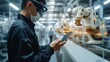© visoot - Engineer using tablet with machine real time monitoring system software in smart factory automotive industrial Industry. Automation robot arm machine. welding robots. Generative AI.