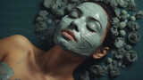 Fototapeta Sypialnia - Woman relaxing in facial mask.