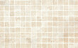 © hadjanebia - beige Mosaic Tiles wall abstract background texture. Close up. Selective focus. Copy space