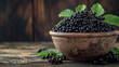 Black elderberries bunch (Sambucus nigra) in an old clay bowl, rustic wood, dark background, generative ai