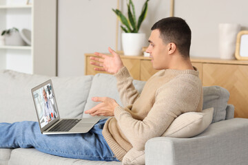 Poster - Ill young man video chatting with doctor at home