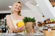 © nataliaderiabina - Smiling woman buying organic food and eco products in sustainable plastic free store. Happy female customer shopping at local grocery shop.