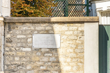 Wall Mural - Memorial plate on the wall of the house of singer Dalida in the Montmartre district in Paris, France