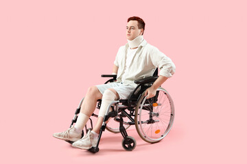 Sticker - Injured young man after accident in wheelchair on pink background