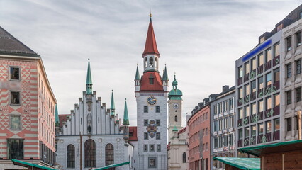 Sticker - Marienplatz with the old Munich town hall and the Talburg Gate timelapse, Bavaria, Germany.