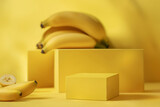 Fototapeta  - Yellow mockup with rectangular podiums and fresh bananas for cosmetic products