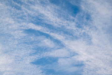 Sticker - Blue sky with white light abstract clouds. Clouds in sky, natural background