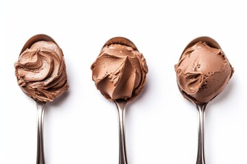 Wall Mural - Top view of isolated spoons with chocolate nougat cream on white background