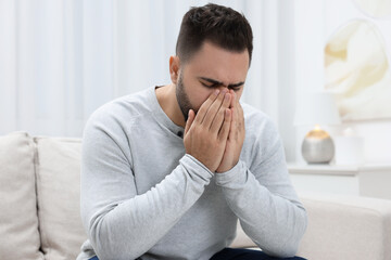 Canvas Print - Sick man coughing at home. Cold symptoms