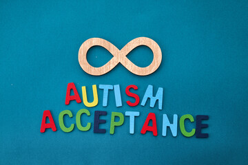 Wall Mural - Celebrating Autism Acceptance Month. The gold infinity symbol