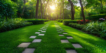 A Beautiful Green Garden Lawn With A Checkerboard Effect, Featuring Lush Trees And Immaculate Grass, Perfect For Outdoor Relaxation And Enjoyment.