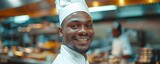 Fototapeta Na drzwi - Skilled AfricanAmerican chef effortlessly creates culinary delights in a bustling professional kitchen. Concept Culinary Skills, African American Chef, Professional Kitchen, Culinary Delights