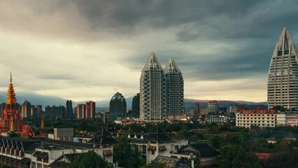 Wall Mural - City skyline of Xishuangbanna timelapsing