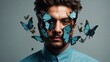 Portrait of a man with butterflies on his face