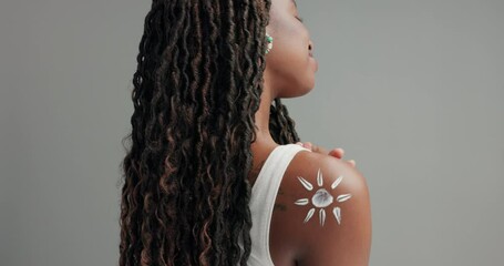 Wall Mural - Paint, flower and woman with beauty on skin in studio and gray background with cosmetics on body. African, girl and happy with creative art or makeup for unique aesthetic and skincare in mockup space